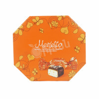Candies with nougat, nuts and caramel in chocolate Merletto