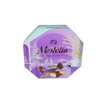 Candies nougat, caramel and puffed rice in chocolate Merletto