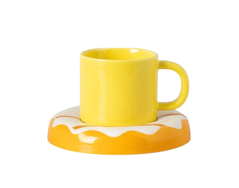 Set of coffee cups with donut holder